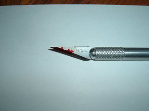 Bloody_X_Acto_Knife5_by_Wrotne